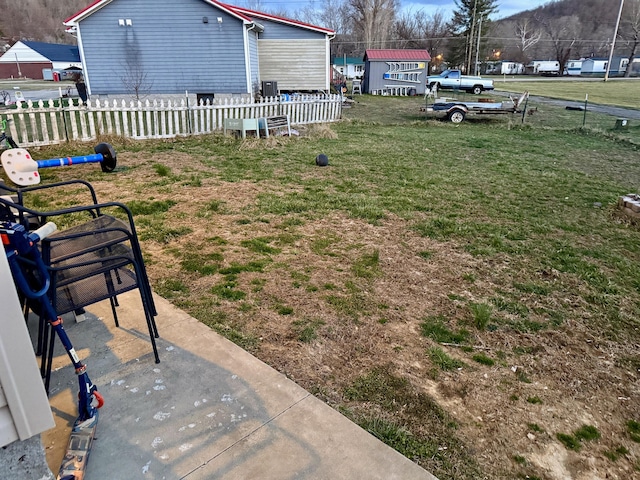 view of yard with fence