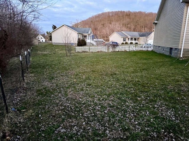 view of yard with fence