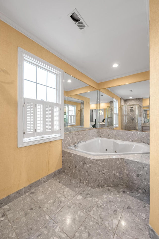 full bathroom featuring crown molding, visible vents, a shower with door, and a jetted tub