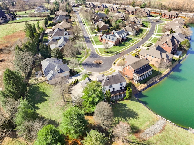 aerial view featuring a residential view and a water view