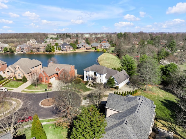 aerial view featuring a residential view and a water view