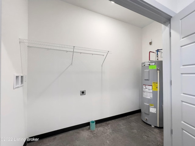 utility room with electric water heater