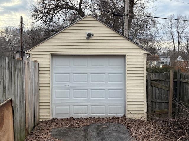 detached garage with fence