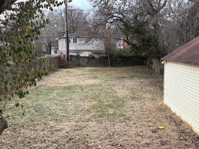 view of yard featuring a fenced backyard