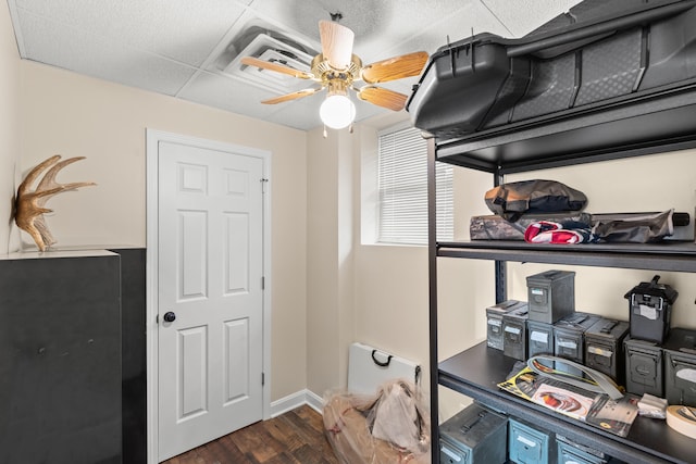 storage featuring ceiling fan and visible vents