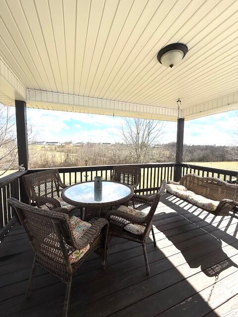 deck featuring outdoor dining space