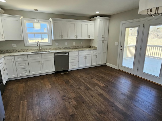 kitchen with dishwasher, dark wood-type flooring, white cabinets, and a sink