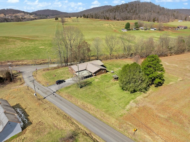 bird's eye view with a mountain view and a rural view