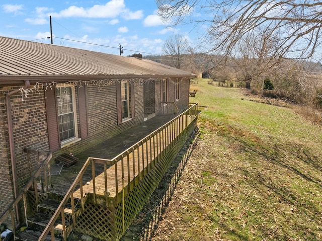 view of yard with a deck