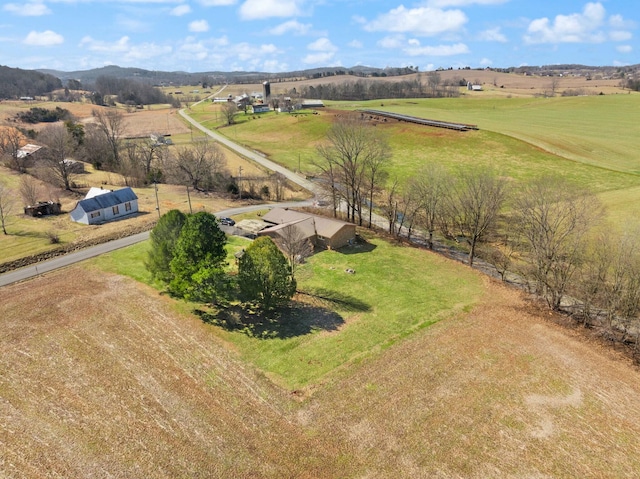 drone / aerial view with a rural view and a mountain view