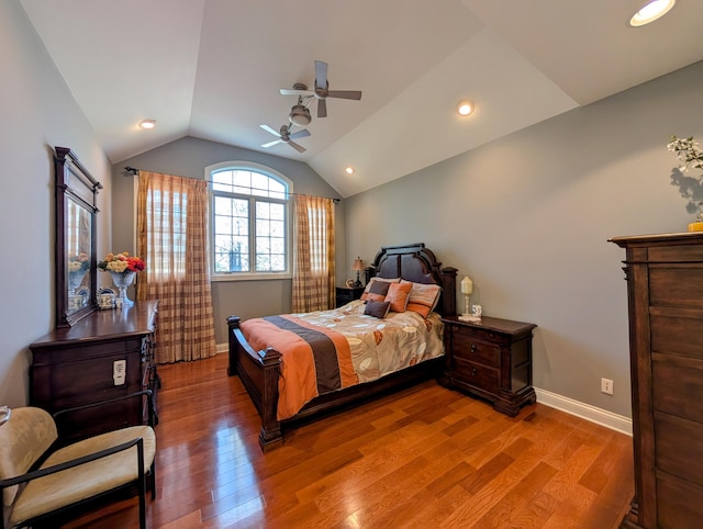 bedroom with light wood finished floors, baseboards, a ceiling fan, vaulted ceiling, and recessed lighting