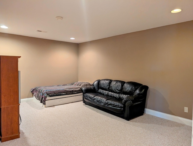 carpeted bedroom with recessed lighting, visible vents, and baseboards