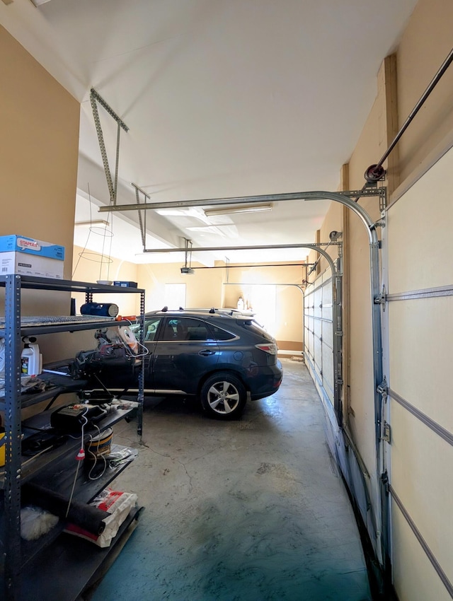 garage featuring a garage door opener