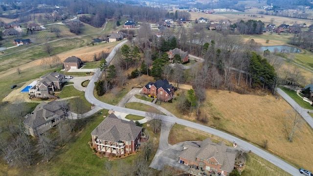 aerial view featuring a rural view and a water view