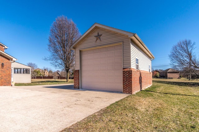 detached garage featuring driveway