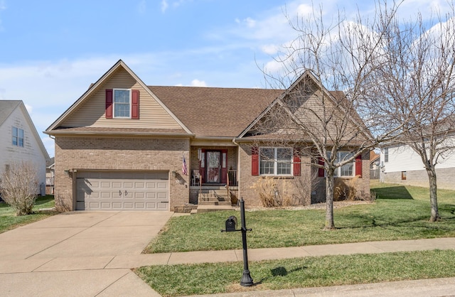 view of front facade with a shingled roof, a front yard, brick siding, and driveway