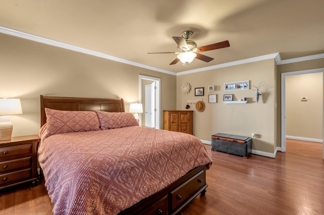 bedroom with dark wood-style floors, baseboards, a ceiling fan, and crown molding