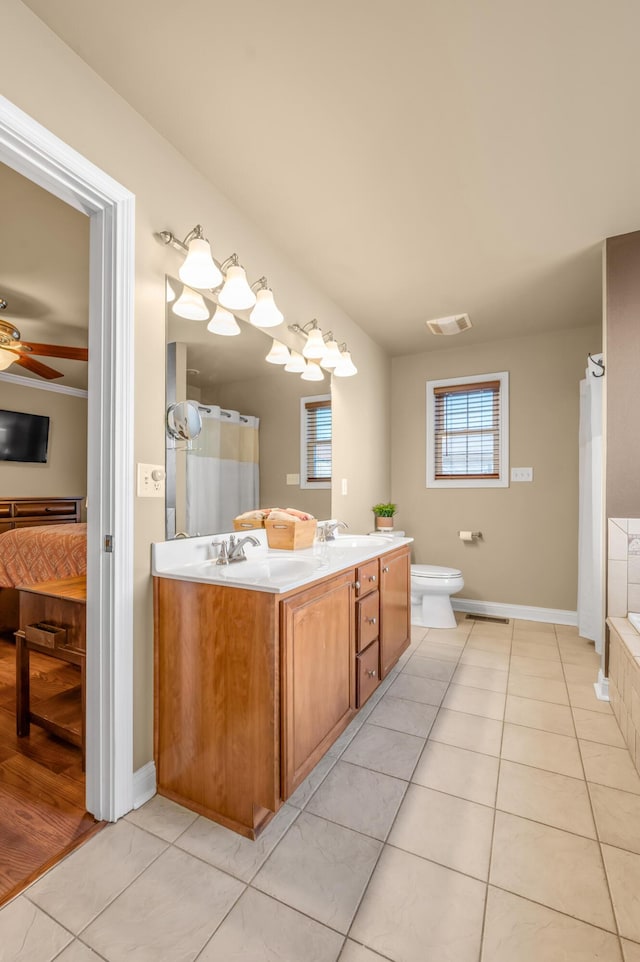 full bath featuring tile patterned flooring, toilet, a sink, visible vents, and double vanity