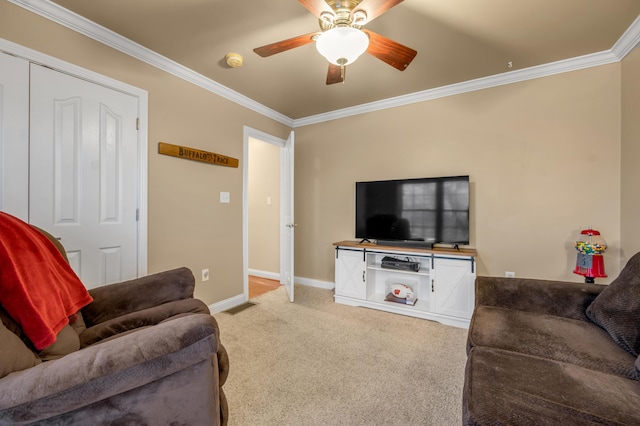 living room featuring ceiling fan, light colored carpet, visible vents, baseboards, and ornamental molding