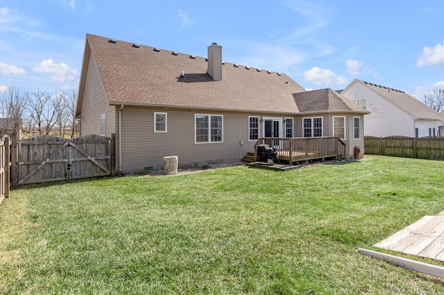 rear view of property with a fenced backyard, a yard, crawl space, a wooden deck, and a gate