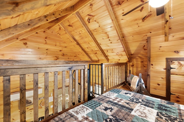 bedroom with wooden walls, wood ceiling, and vaulted ceiling with beams