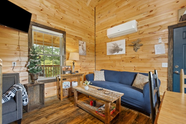 living area with wood walls, a wall mounted air conditioner, and wood finished floors