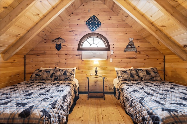 bedroom with lofted ceiling with beams, hardwood / wood-style flooring, wooden walls, and wood ceiling