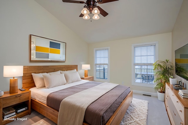 bedroom featuring lofted ceiling, visible vents, a ceiling fan, and light colored carpet