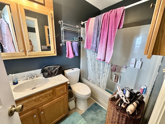 bathroom featuring tile patterned flooring, shower / tub combo with curtain, vanity, and toilet