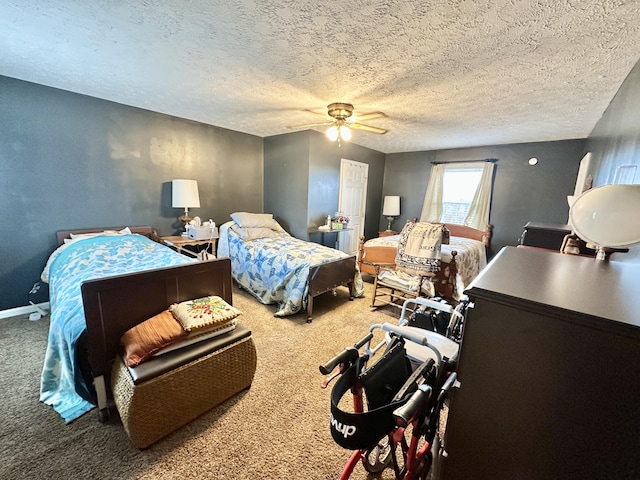 bedroom with a textured ceiling, carpet, a ceiling fan, and baseboards