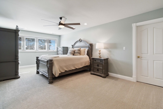 bedroom featuring baseboards, recessed lighting, a ceiling fan, and light colored carpet