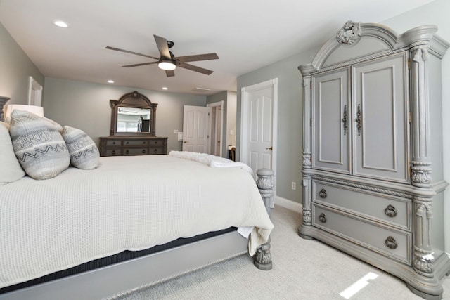 bedroom with a ceiling fan, recessed lighting, light colored carpet, and baseboards