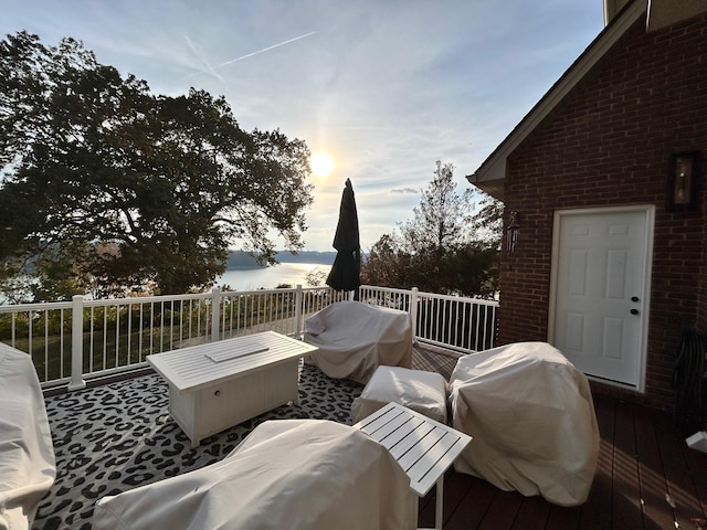 wooden terrace featuring grilling area