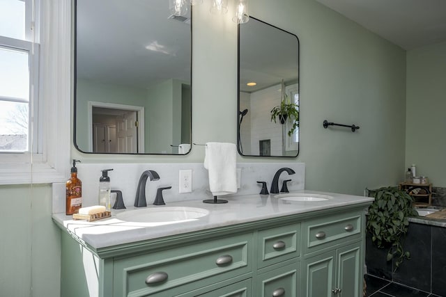 bathroom featuring double vanity and a sink