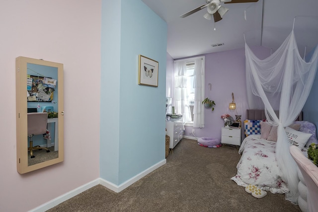 bedroom featuring carpet and baseboards