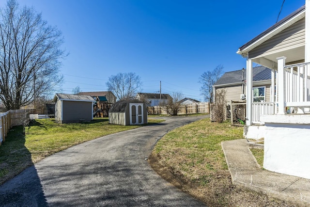 view of road with aphalt driveway