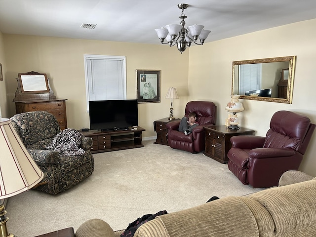 living room with carpet floors, an inviting chandelier, and visible vents