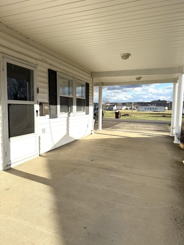 44 Pine St, Crab Orchard, KY 40419 - view of patio with a carport