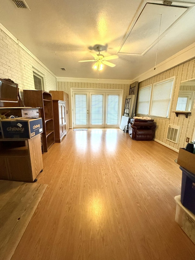 44 Pine St, Crab Orchard, KY 40419 - living area featuring a ceiling fan, wood finished floors, attic access, and a textured ceiling