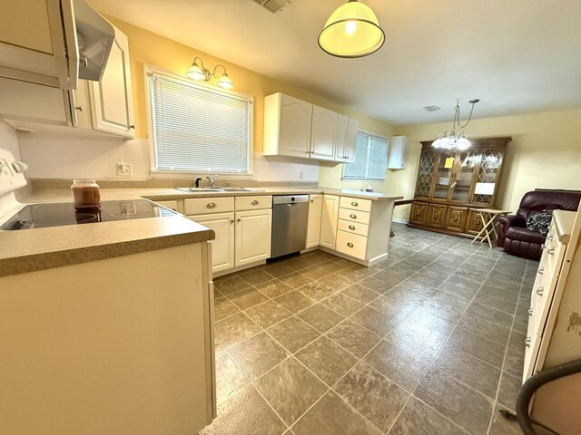 44 Pine St, Crab Orchard, KY 40419 - kitchen featuring stainless steel dishwasher, range with electric stovetop, light countertops, decorative light fixtures, and a peninsula