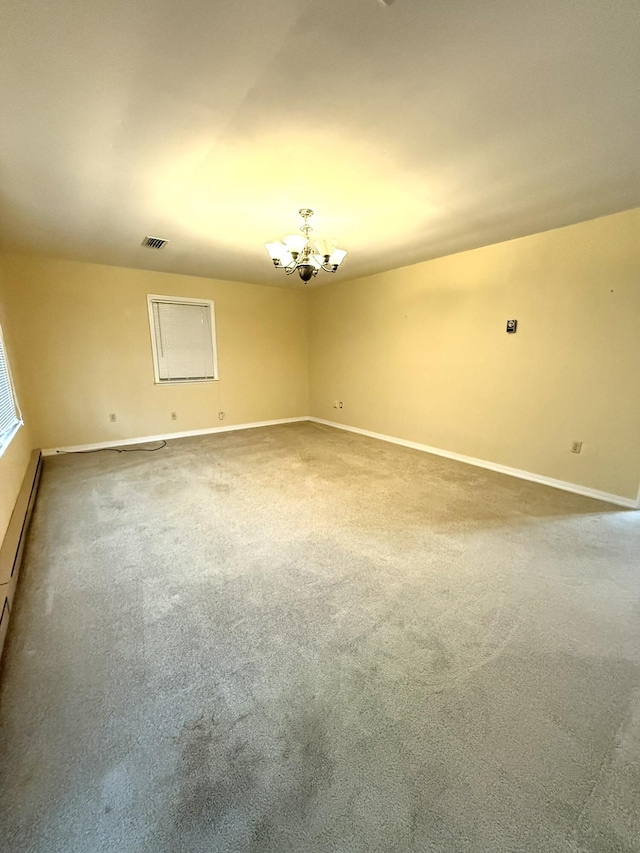 44 Pine St, Crab Orchard, KY 40419 - empty room featuring a chandelier, baseboards, and carpet