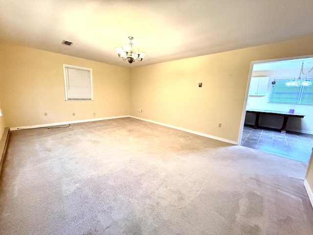 44 Pine St, Crab Orchard, KY 40419 - unfurnished room featuring a chandelier, baseboards, and carpet flooring