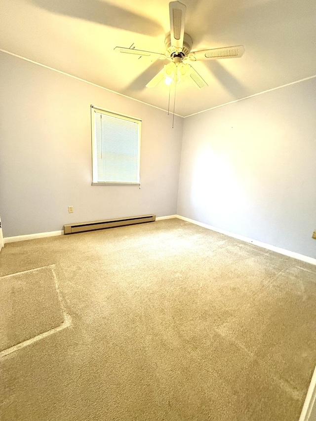 44 Pine St, Crab Orchard, KY 40419 - unfurnished room with a baseboard radiator, carpet, a ceiling fan, and baseboards