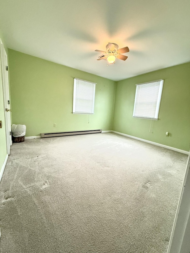 44 Pine St, Crab Orchard, KY 40419 - carpeted spare room featuring a ceiling fan, a baseboard radiator, and baseboards