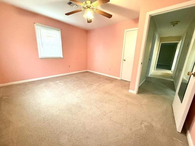 44 Pine St, Crab Orchard, KY 40419 - unfurnished bedroom featuring light carpet, baseboards, and ceiling fan