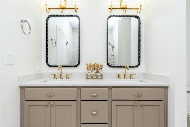 full bath with double vanity and a sink