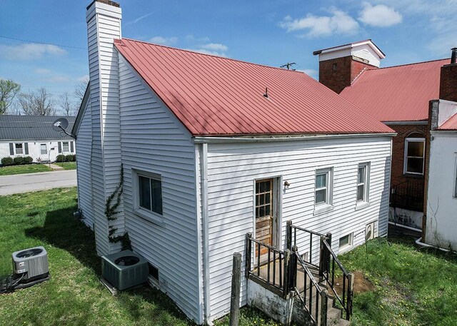 view of front of home with metal roof and a porch