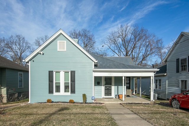 view of front of house with a porch and a front lawn