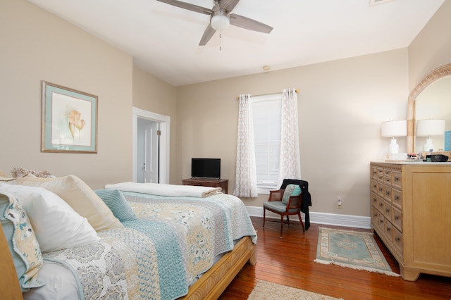 bedroom with baseboards, ceiling fan, and hardwood / wood-style floors