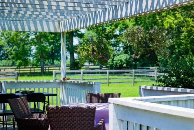 view of patio / terrace with fence and a pergola